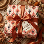 Rustic boho cactus wrapping paper with terracotta ribbon and gift tag by Wrapped Studios.