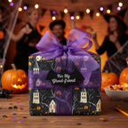 Halloween gift wrapped in spooky pumpkin and haunted house paper with purple ribbon, bat tag, and party scene.