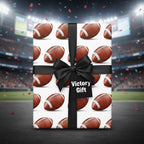 Football wrapping paper for a victory gift with black ribbon and bow.