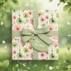 Square gift wrapped in floral wrapping paper with sage green ribbon and a "From My Heart" tag.