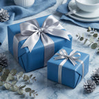 Two blue gift boxes wrapped in solid color paper with silver satin ribbon for a birthday, Christmas, or baby shower present.