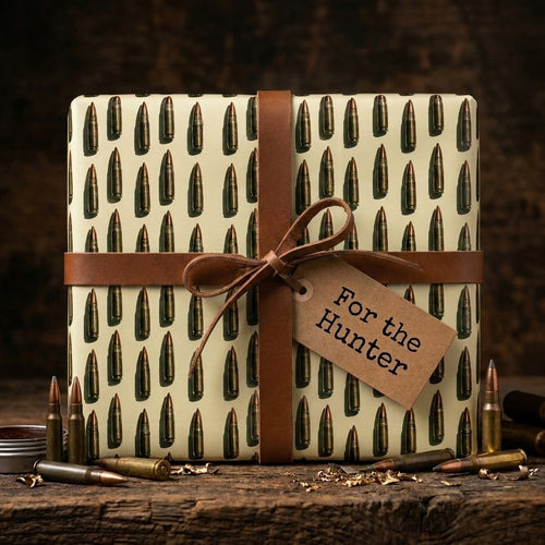 Ammunition wrapping paper with bullet pattern and leather strap, rustic hunter gift wrap by Wrapped Studios.