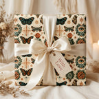 Vintage moth and butterfly wrapping paper with ivory ribbon, luxury gift wrap by Wrapped Studios.