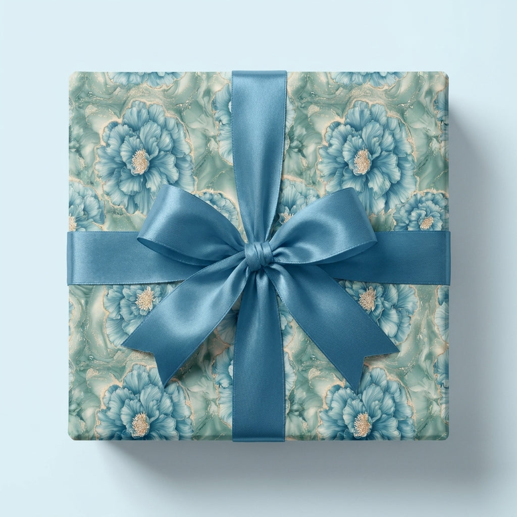 Luxury blue floral wrapping paper by Wrapped Studios, featuring an elegant gift box tied with a teal satin bow.
