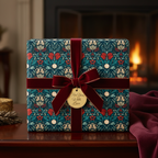 Luxury Christmas wrapping paper with a vintage floral pattern, rich teal and red colors, a deep red velvet ribbon, and a gold "For You, With Love" tag.