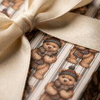 Teddy bear wrapping paper with cream satin bow for baby shower or Christmas gift wrap by Wrapped Studios.