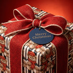 Teddy bear Christmas wrapping paper with red burlap ribbon and holiday tag, by Wrapped Studios.