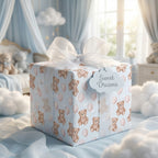 Teddy bear baby shower wrapping paper with white ribbon in a nursery by Wrapped Studios.