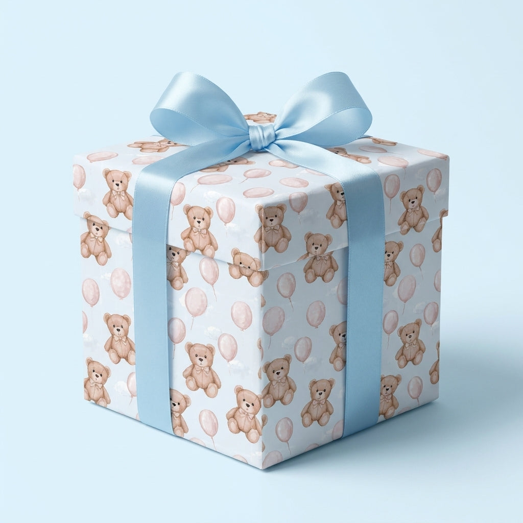 Teddy bear baby shower wrapping paper on a blue gift box with a satin ribbon, by Wrapped Studios.