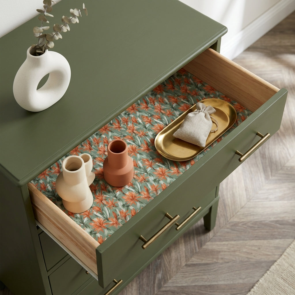Sage green and terracotta floral wrapping paper used as a drawer liner by Wrapped Studios.