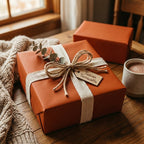 Rustic terracotta gift wrapped with burlap ribbon and twine bow, perfect for Christmas or birthdays.