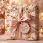 Harvest Thanksgiving wrapping paper with turkeys, pumpkins, and a pink satin ribbon by Wrapped Studios.