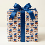 Cute tiger graduation wrapping paper with a blue satin bow on a gift box by Wrapped Studios.