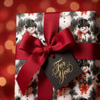 Snowman Christmas wrapping paper by Wrapped Studios, featuring a luxury red bow and a 'For You' tag.