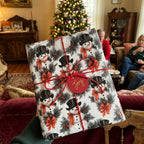 Vintage snowman Christmas gift wrap by Wrapped Studios tied with red twine and a Joy tag.