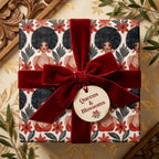 Luxury floral wrapping paper featuring Black women and a red velvet bow, by Wrapped Studios.