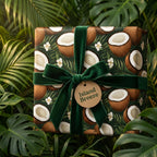 Dark green tropical coconut wrapping paper with a green velvet ribbon and 'Island Breeze' tag.
