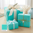 Aqua teal wrapping paper on gifts with ribbons; elegant solid color gift wrap for birthdays or special occasions.
