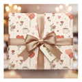 Elegant beige romantic wrapping paper with red hearts, balloons, and flowers, tied with a satin bow and "With Love" tag for Valentine's Day or anniversary gifts.
