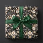 Luxury Christmas gift wrap with a vintage ornament pattern and green satin bow, by Wrapped Studios.