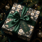 Luxury Christmas wrapping paper with a green satin bow and vintage ornament design by Wrapped Studios.