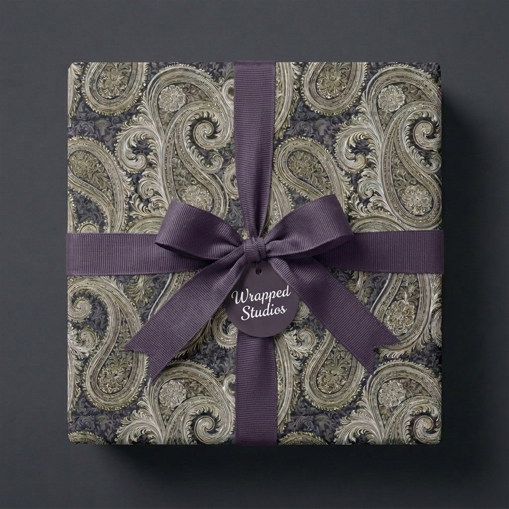 Luxury vintage paisley wrapping paper with a dark purple ribbon by Wrapped Studios.