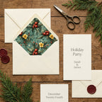 Elegant Christmas botanical envelope liner and holiday invitation on rustic wood, by Wrapped Studios.
