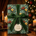 Luxury vintage botanical Christmas wrapping paper with green velvet bow by Wrapped Studios.