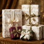 Luxury vintage angel Christmas wrapping paper on holiday gift boxes by Wrapped Studios.