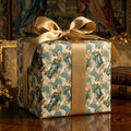 Luxury vintage angel Christmas wrapping paper with gold satin ribbon by Wrapped Studios.