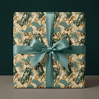 Vintage angel luxury gift wrap in teal and gold with satin ribbon by Wrapped Studios.