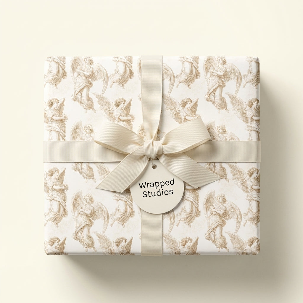 Vintage angel Christmas wrapping paper with cream ribbon, luxury holiday gift wrap by Wrapped Studios.