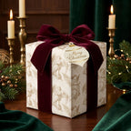 Vintage angel Christmas wrapping paper with luxury burgundy velvet ribbon by Wrapped Studios.