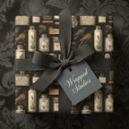 Elegant black gift wrap featuring vintage apothecary bottle and bird pattern with gray ribbon.