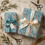 Astronaut outer space wrapping paper on blue gift boxes with satin ribbons, by Wrapped Studios.
