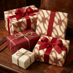 Vintage baseball wrapping paper on gift boxes with red ribbons by Wrapped Studios.