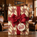 Vintage baseball wrapping paper with a red bow and MVP tag, sports gift wrap by Wrapped Studios.