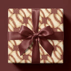 Vintage baseball wrapping paper with a maroon satin bow on a gift box by Wrapped Studios.