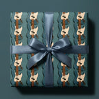 Teal guitar wrapping paper with matching satin bow, cool music gift wrap by Wrapped Studios.