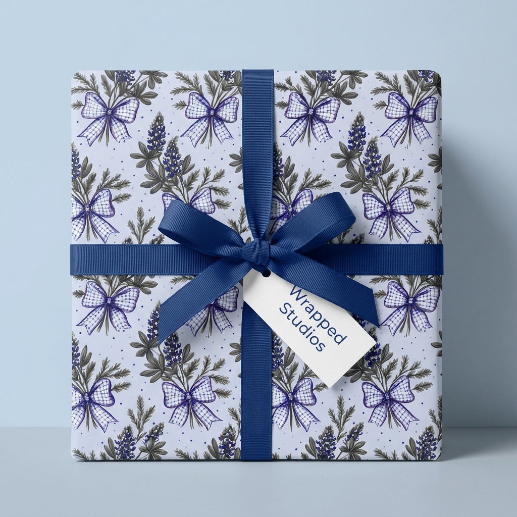 Blue floral wrapping paper with lupines and a navy bow, elegant gift wrap by Wrapped Studios.