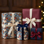 Vintage book wrapping paper on holiday gift boxes with luxury ribbons by Wrapped Studios.