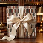 Vintage book wrapping paper by Wrapped Studios with a cream satin bow in a cozy library.