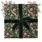 Luxury Christmas wrapping paper with dark green velvet ribbon, featuring pink and gold ornaments on a botanical evergreen pattern.