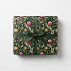 Elegant Christmas gift wrap with vintage botanical holly, berries, and ornaments on a dark background, tied with a deep green satin ribbon.