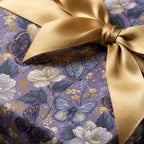 Luxury purple butterfly and floral wrapping paper with gold satin bow, elegant gift wrap by Wrapped Studios.