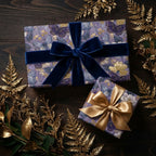 Luxury purple butterfly wrapping paper with blue velvet and gold bows by Wrapped Studios.
