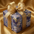 Elegant lavender butterfly and floral wrapping paper with gold bow, luxury gift wrap by Wrapped Studios.