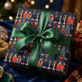 Cat Christmas wrapping paper featuring dressed-up winter cats and green ribbon by Wrapped Studios.