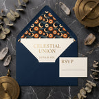 Celestial wedding invitation with navy sun and moon envelope liner and RSVP card by Wrapped Studios.