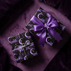 Celestial moon and stars purple wrapping paper on luxury gift boxes by Wrapped Studios.
